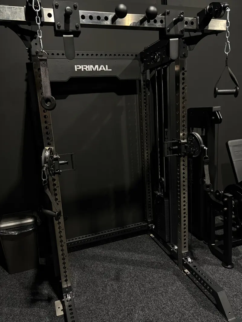 Primal functional rig with cable attachments and adjustable pull-up station in the strength zone
